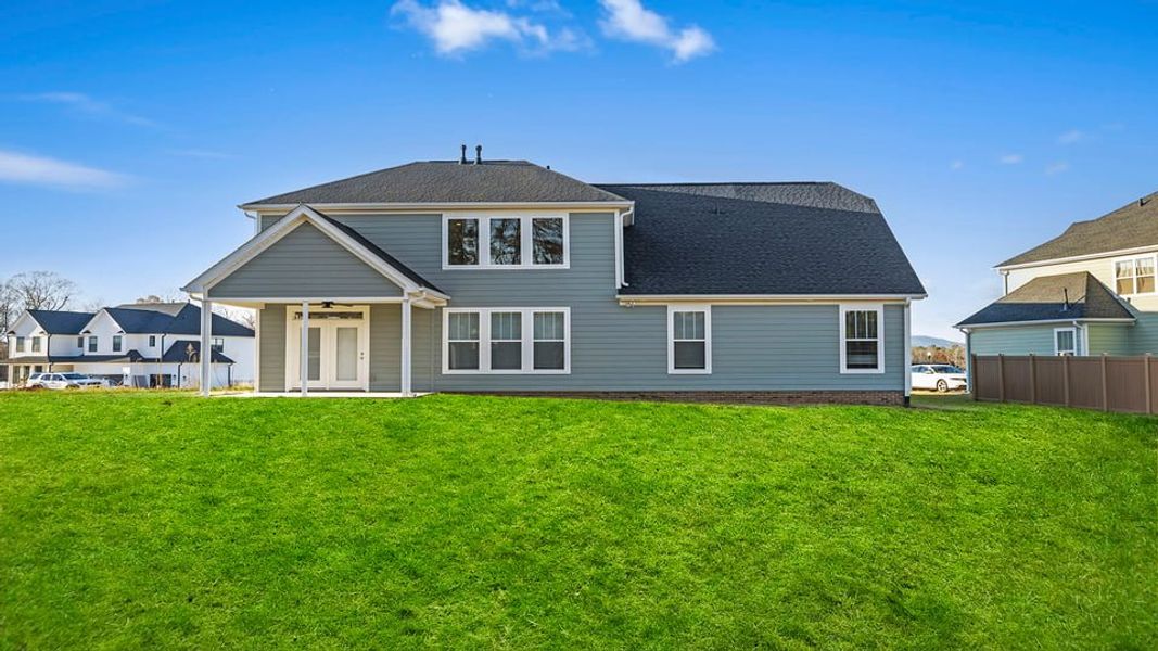 Exterior details and patio area of a home in Alder Pond, Campobello (Image 3).