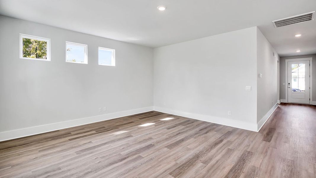 Representative unfurnished interior of a home built from the BRADFORD by D.R. Horton in Indigo Preserve, Leland (Image 27).