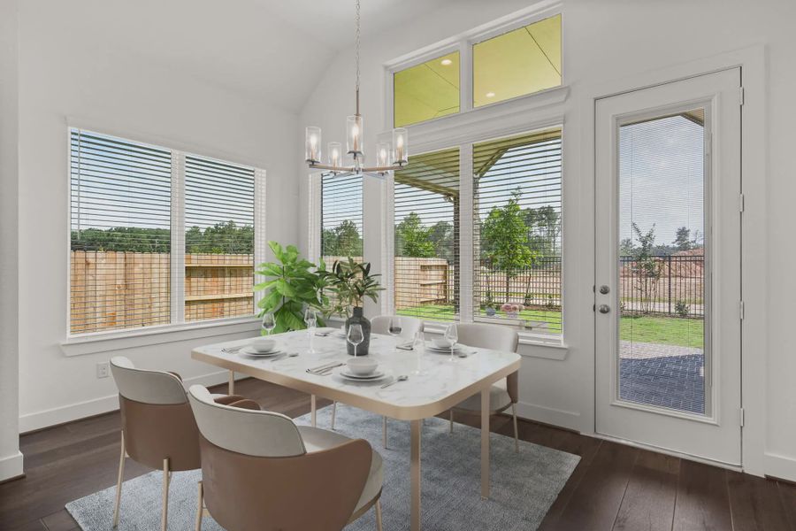 Representative furnished interior of a home built from the Marion by Chesmar Homes in Sunterra, Katy (Image 16).