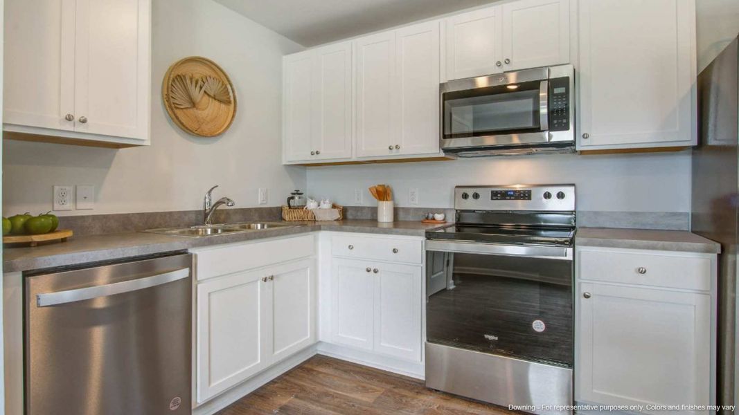 Representative furnished interior of a home built from the DOWNING by D.R. Horton in Carolina Groves, Moncks Corner (Image 7).