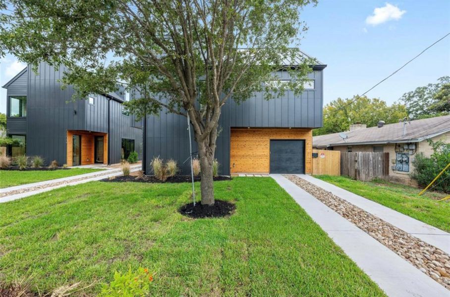 Front exterior of a new home in , Austin, TX, highlighting curb appeal (Image 1). Front exterior of a new home in , Austin, TX, highlighting curb appeal (Image 1).