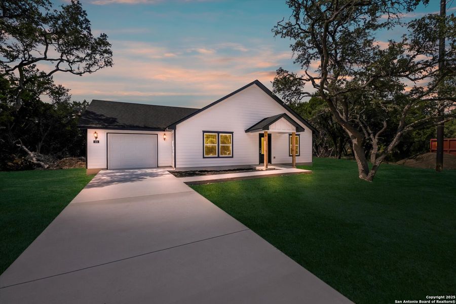Front exterior of a new home in , Bandera, TX, highlighting curb appeal (Image 2). Front exterior of a new home in , Bandera, TX, highlighting curb appeal (Image 2).