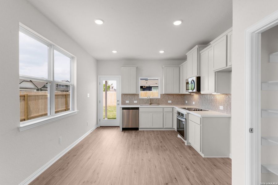Furnished interior view inside a new home in Casinas at Gruene, New Braunfels (Image 4).