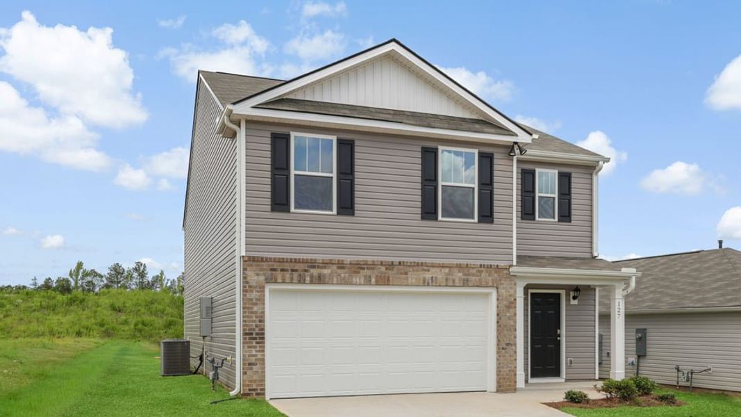 Front exterior of a new home in Cloverdale Hills, Piedmont, SC, highlighting curb appeal (Image 2). Front exterior of a new home in Cloverdale Hills, Piedmont, SC, highlighting curb appeal (Image 2).
