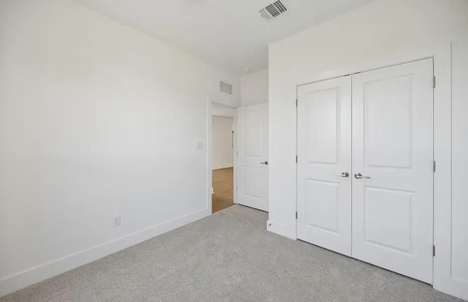 Spacious, unfurnished interior of a new home in Saddleback at Santa Rita Ranch, Liberty Hill (Image 22).