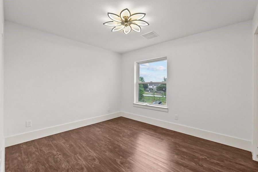 View of the second of four bedrooms upstairs