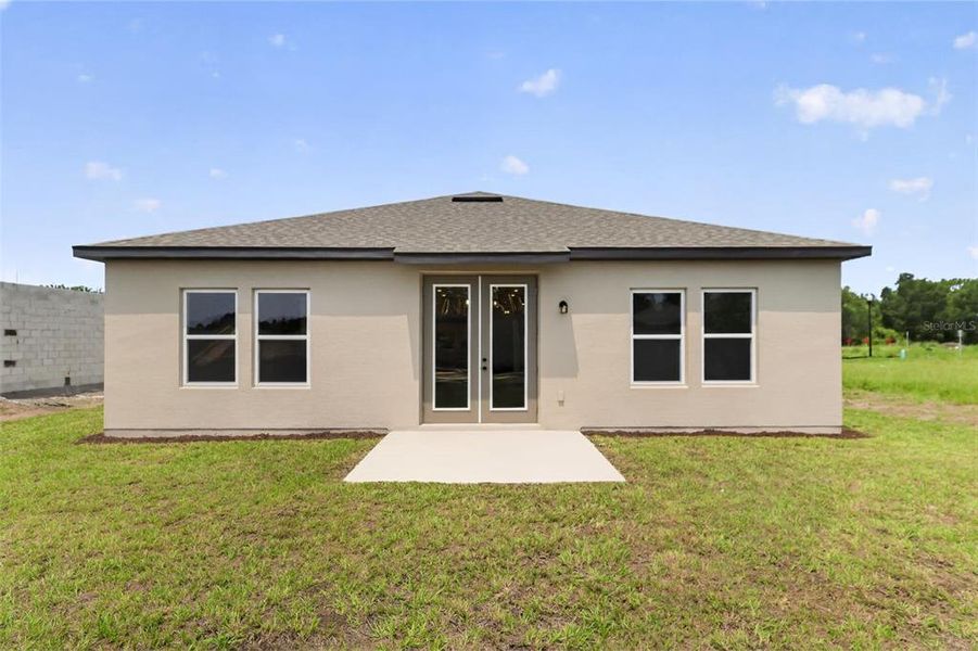 Exterior details and patio area of a home in Tyson Reserve, St. Cloud (Image 3).