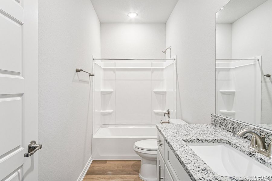 Furnished interior view inside a new home in Magnolia Village North, San Antonio (Image 11).