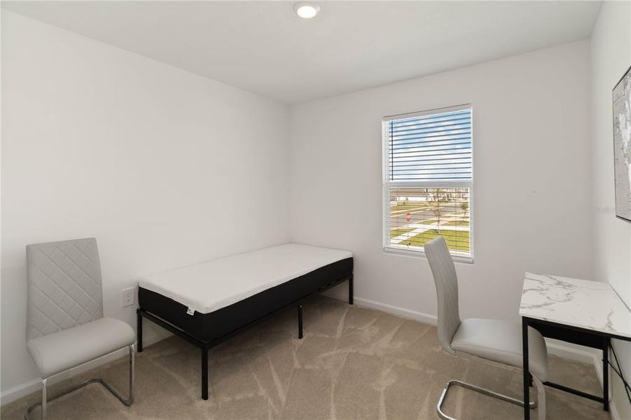 Furnished interior view inside a new home in Peace Creek Reserve: Manor Key Collection, Winter Haven (Image 41).