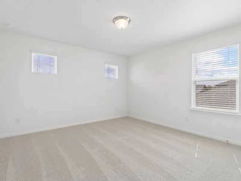 Spacious, unfurnished interior of a new home in Colony at Cole Springs - Boulevard Collection, Buda (Image 15).