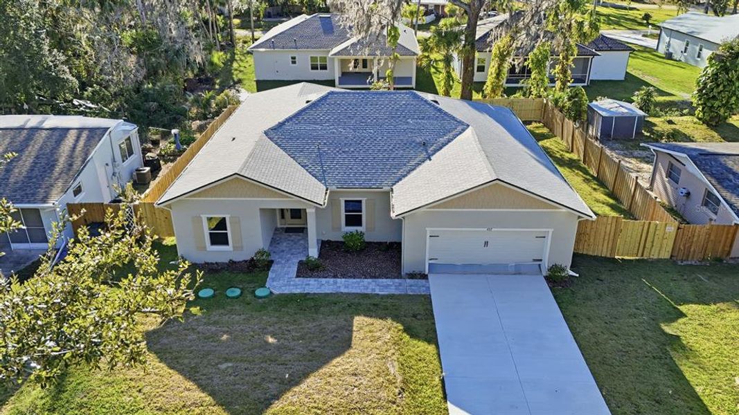 Front exterior of a new home in , New Smyrna Beach, FL, highlighting curb appeal (Image 21).