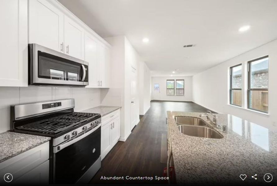 Interior photos- Photo of Pulte model home with same floor plan, not of actual home listed.