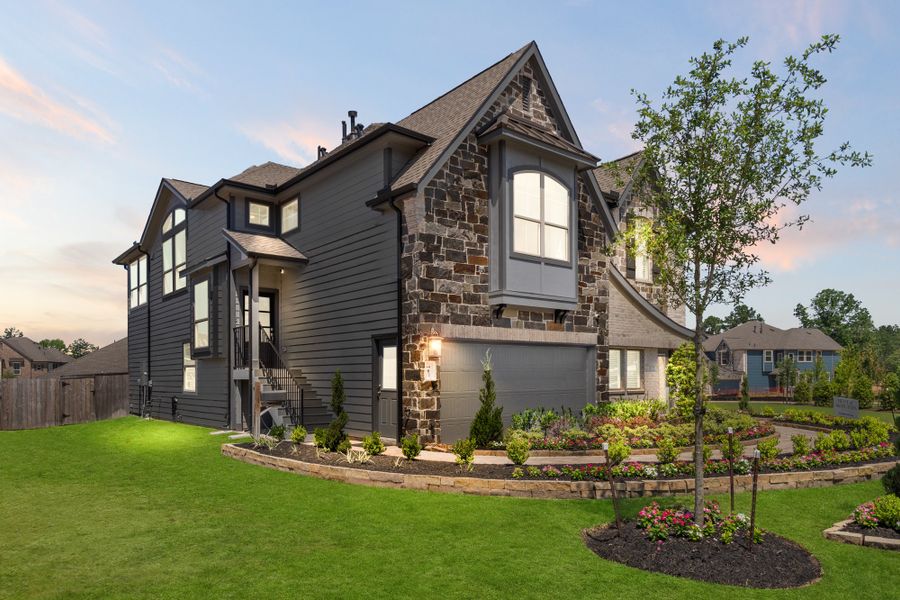 Front exterior of a new home in Woodforest, Montgomery, TX, highlighting curb appeal (Image 26). Front exterior of a new home in Woodforest, Montgomery, TX, highlighting curb appeal (Image 26).