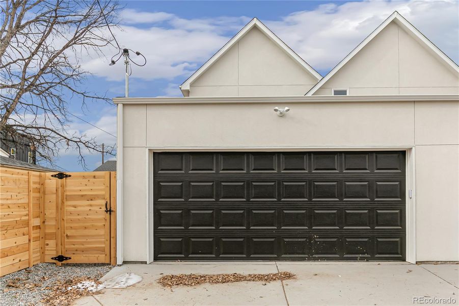 Front exterior of a new home in , Englewood, CO, highlighting curb appeal (Image 1).