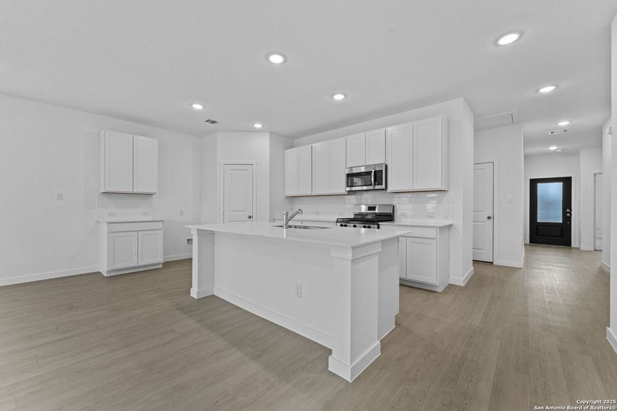 Furnished interior view inside a new home in Guadalupe Heights, Seguin (Image 7).