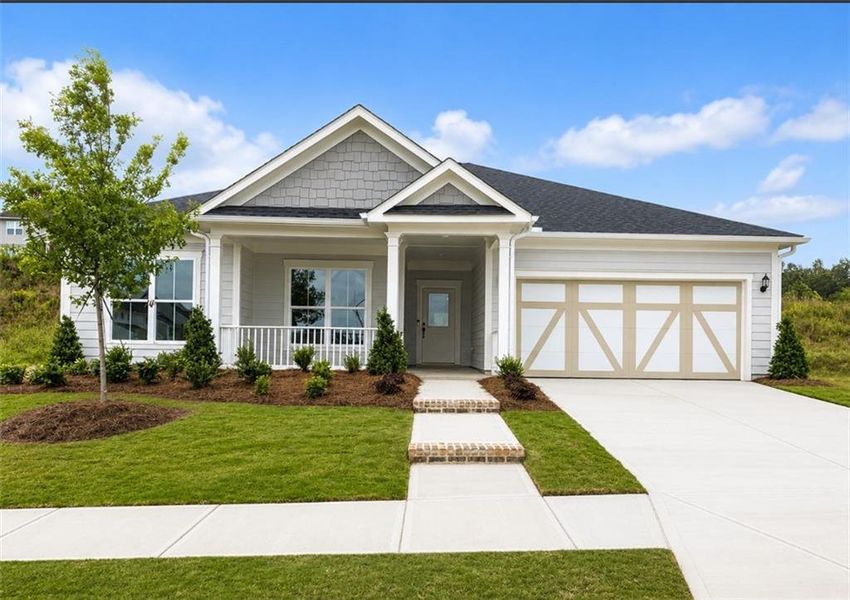 Front exterior of a new home in Reunion, Flowery Branch, GA, highlighting curb appeal (Image 1). Front exterior of a new home in Reunion, Flowery Branch, GA, highlighting curb appeal (Image 1).