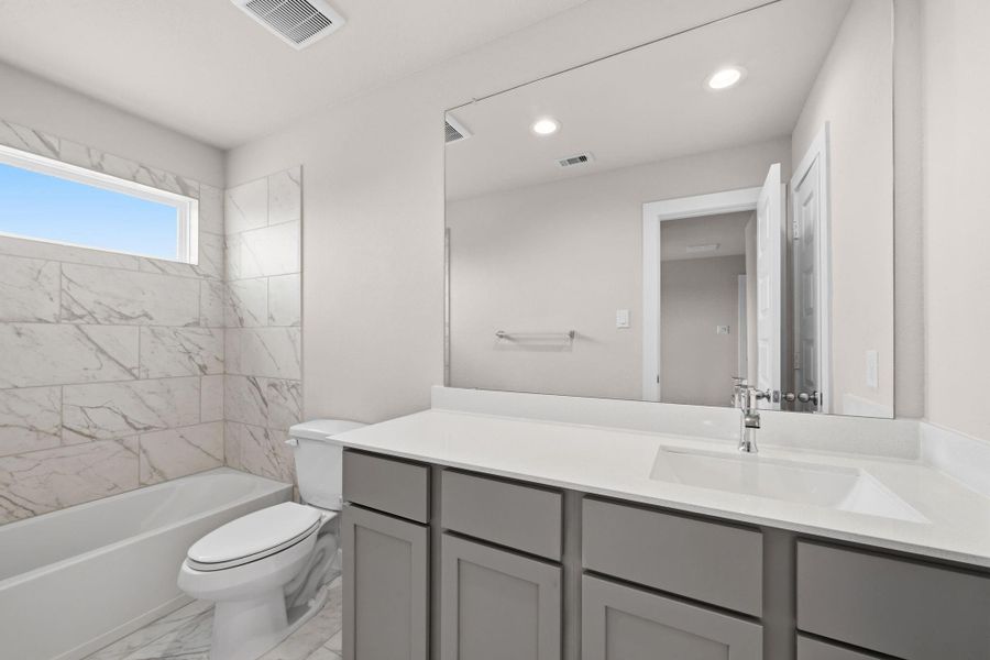 Furnished interior view inside a new home in Sunterra Lakes, Fulshear (Image 8).