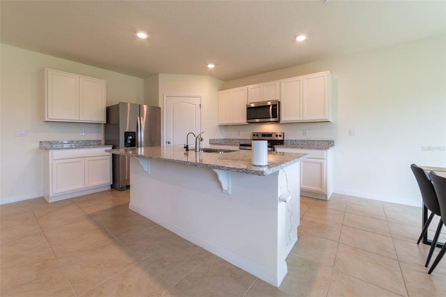 Furnished interior view inside a new home in , Harmony (Image 9).