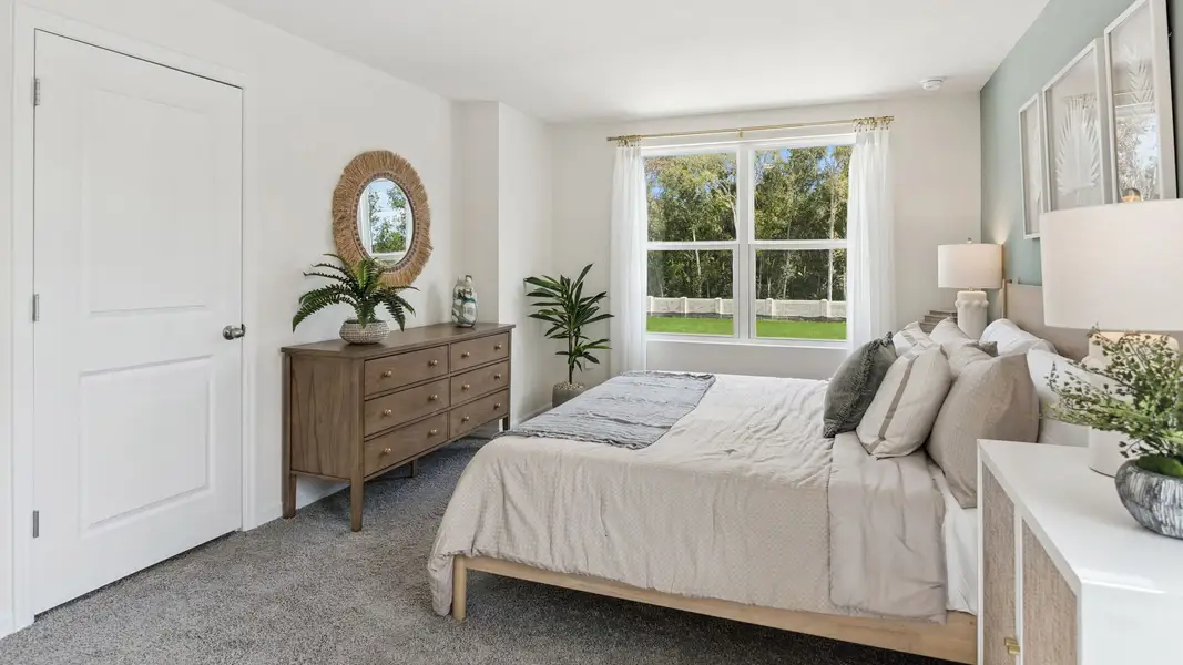 Representative furnished interior of a home built from the PEARSON by D.R. Horton in Fish Lake Cove, Kissimmee (Image 12).