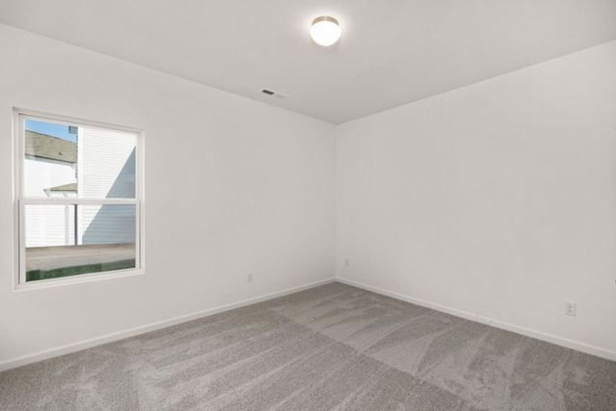 Representative unfurnished interior of a home built from the Dobson by True Homes in Westbrook Falls, Colfax (Image 17).