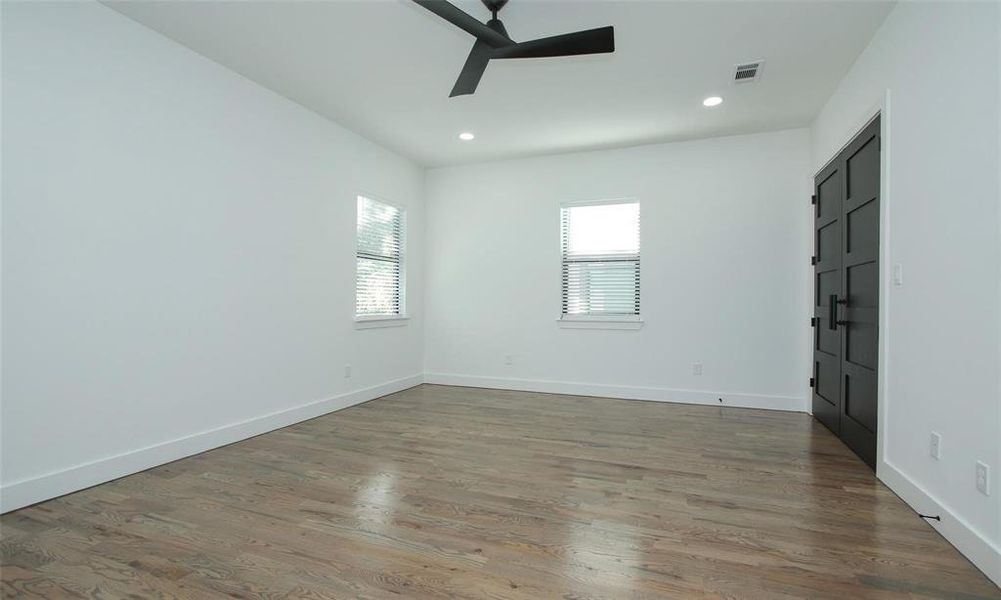 View of the larger secondary bedroom on the second floor,