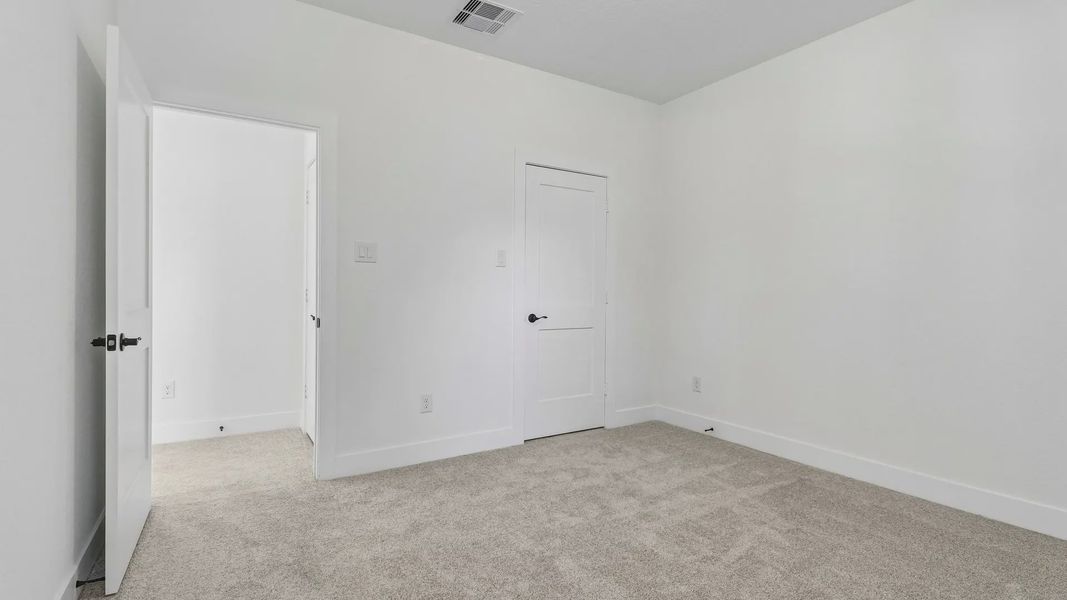 Spacious, unfurnished interior of a new home in The Woodland Hills 50', Willis (Image 36). Spacious, unfurnished interior of a new home in The Woodland Hills 50', Willis (Image 36).
