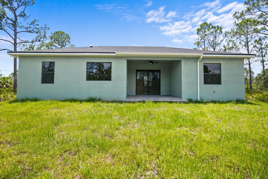 Exterior details and patio area of a home in , Port Charlotte (Image 3). Exterior details and patio area of a home in , Port Charlotte (Image 3).
