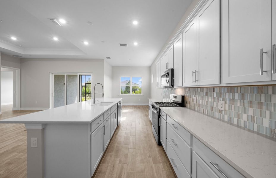 Furnished interior view inside a new home in Del Webb Oak Creek, North Fort Myers (Image 9).