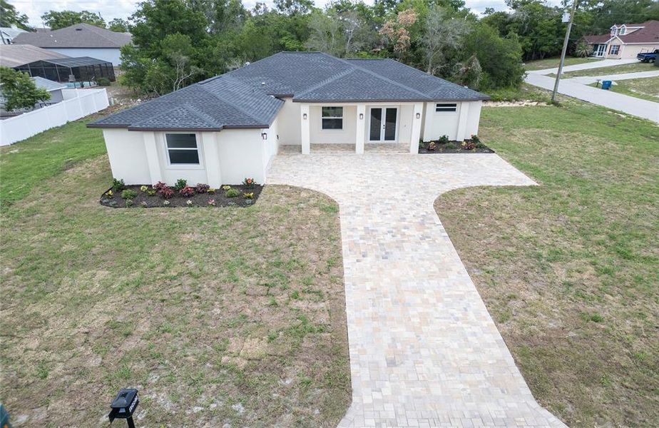 Front exterior of a new home in , Spring Hill, FL, highlighting curb appeal (Image 27). Front exterior of a new home in , Spring Hill, FL, highlighting curb appeal (Image 27).