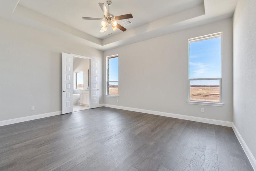 Primary Bedroom | Concept 2915 at The Meadows in Gunter, TX by Landsea Homes