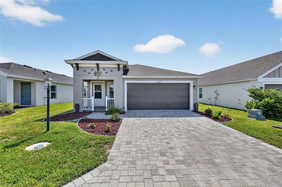 Front exterior of a new home in Cherrywood Preserve, Ocala, FL, highlighting curb appeal (Image 22). Front exterior of a new home in Cherrywood Preserve, Ocala, FL, highlighting curb appeal (Image 22).