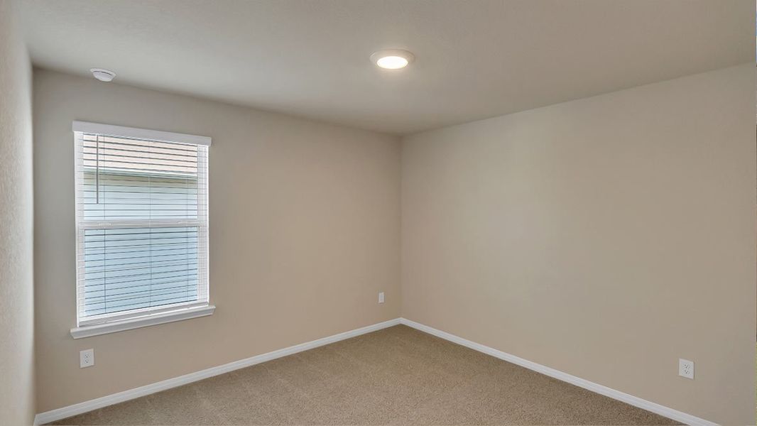 Representative unfurnished interior of a home built from the The Quincy by D.R. Horton in Monarch Ranch, Manor (Image 13).