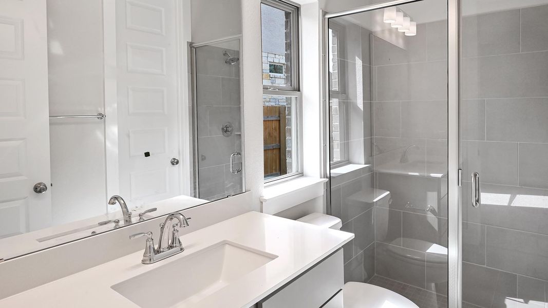 Furnished interior view inside a new home in 6 Creeks 60', Kyle (Image 10).