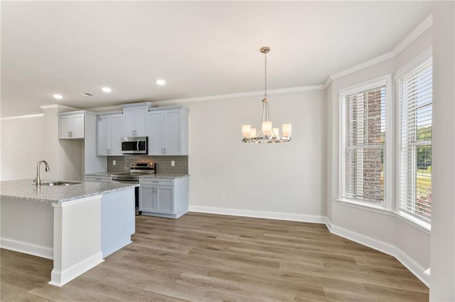 Furnished interior view inside a new home in Towns at Enclave, Lawrenceville (Image 10).