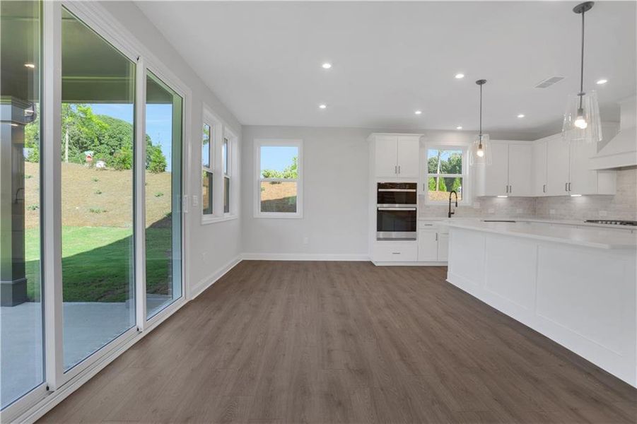 Spacious, unfurnished interior of a new home in The Paddocks at Doc Hughes, Buford (Image 23).