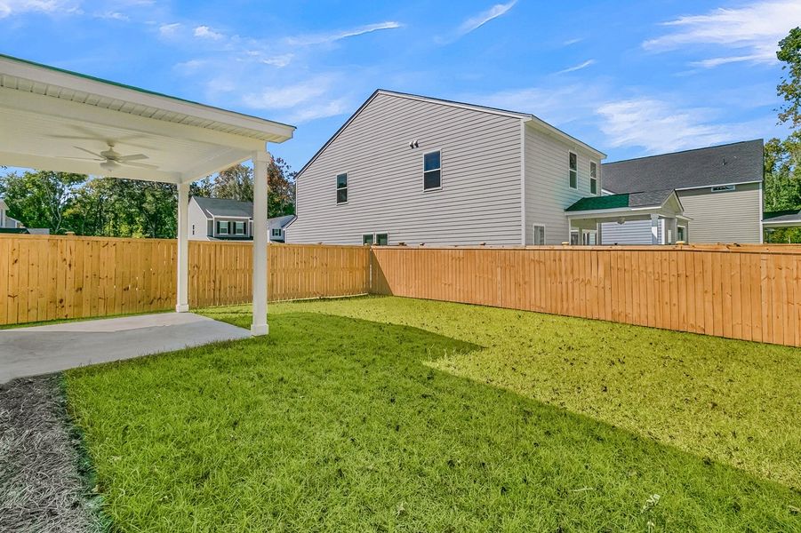 Exterior details and patio area of a home in Central Creek, Goose Creek (Image 26).