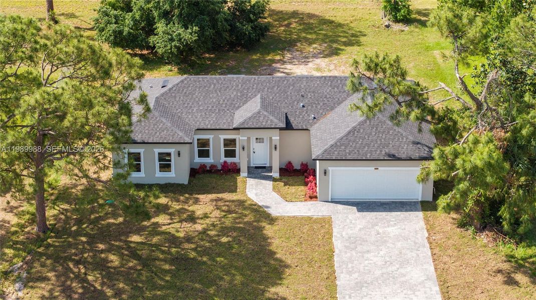 Front exterior of a new home in , Sebring, FL, highlighting curb appeal (Image 28).