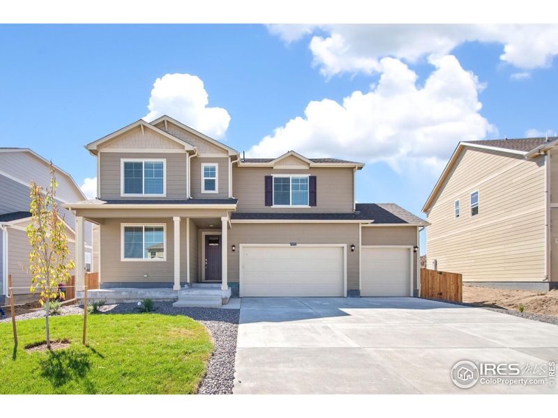 Front exterior of a new home in Northridge Estates, Greeley, CO, highlighting curb appeal (Image 2). Front exterior of a new home in Northridge Estates, Greeley, CO, highlighting curb appeal (Image 2).