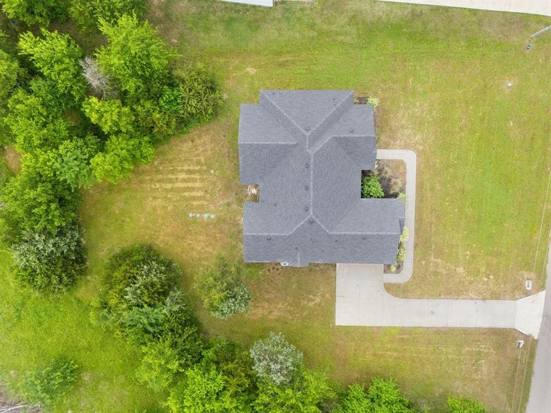 Front exterior of a new home in , Greenville, TX, highlighting curb appeal (Image 21).