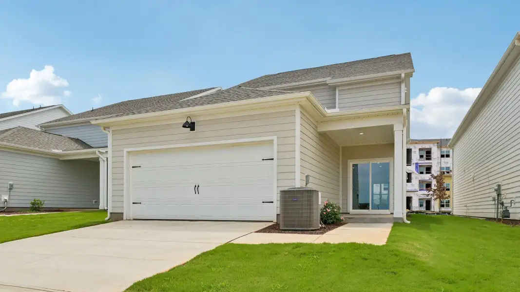 Front exterior of a new home in Collins Ridge, Hillsborough, NC, highlighting curb appeal (Image 22).