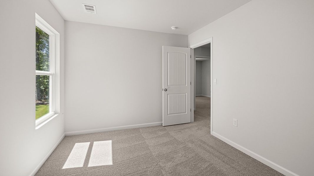 Spacious, unfurnished interior of a new home in Waypoint, Flowery Branch (Image 23).
