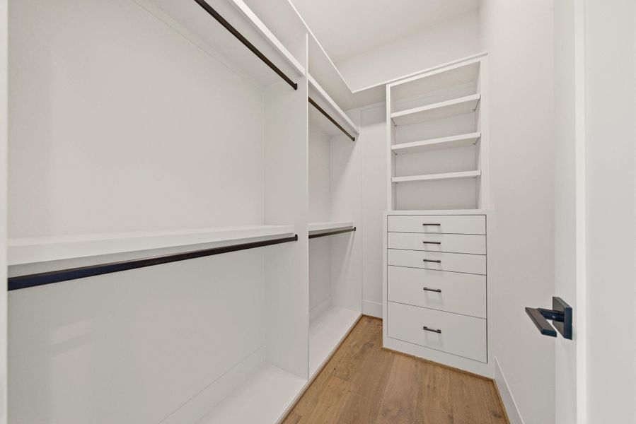 All secondary bedrooms have large walk-in closets with built-in dressers.