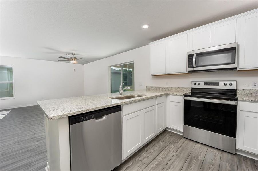 Furnished interior view inside a new home in Gum Lake Preserve, Lake Alfred (Image 8).