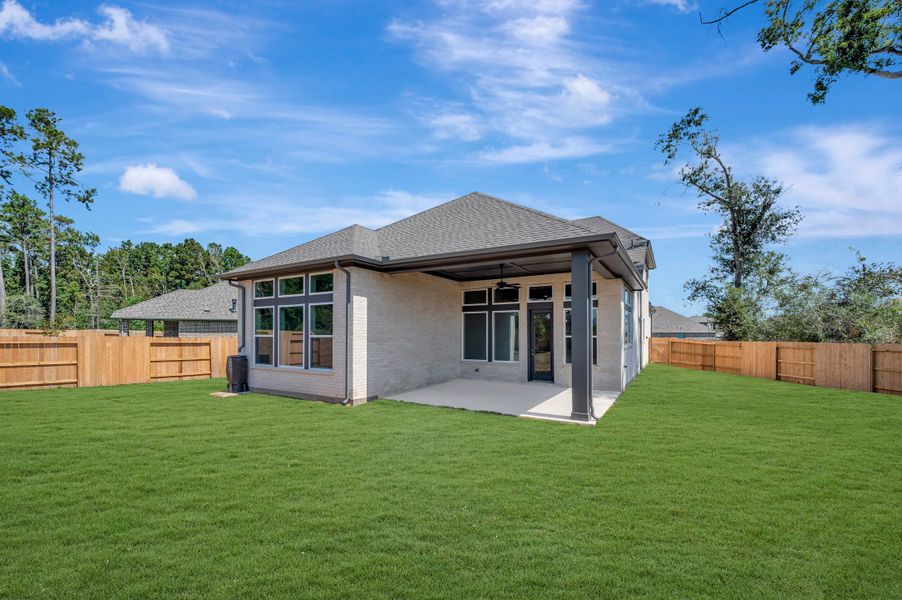Exterior details and patio area of a home in ARTAVIA - Reserve Collection, Conroe (Image 27).