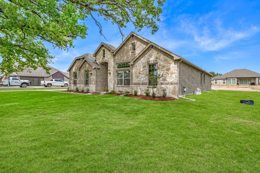 Front exterior of a new home in Lakeview Estates, Canton, TX, highlighting curb appeal (Image 25).