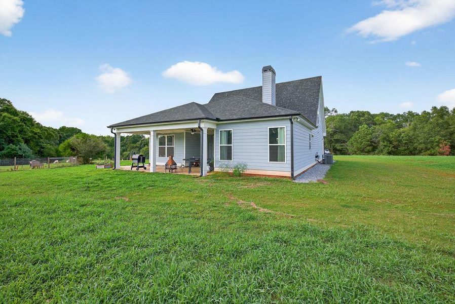 Front exterior of a new home in , Bogart, GA, highlighting curb appeal (Image 20).
