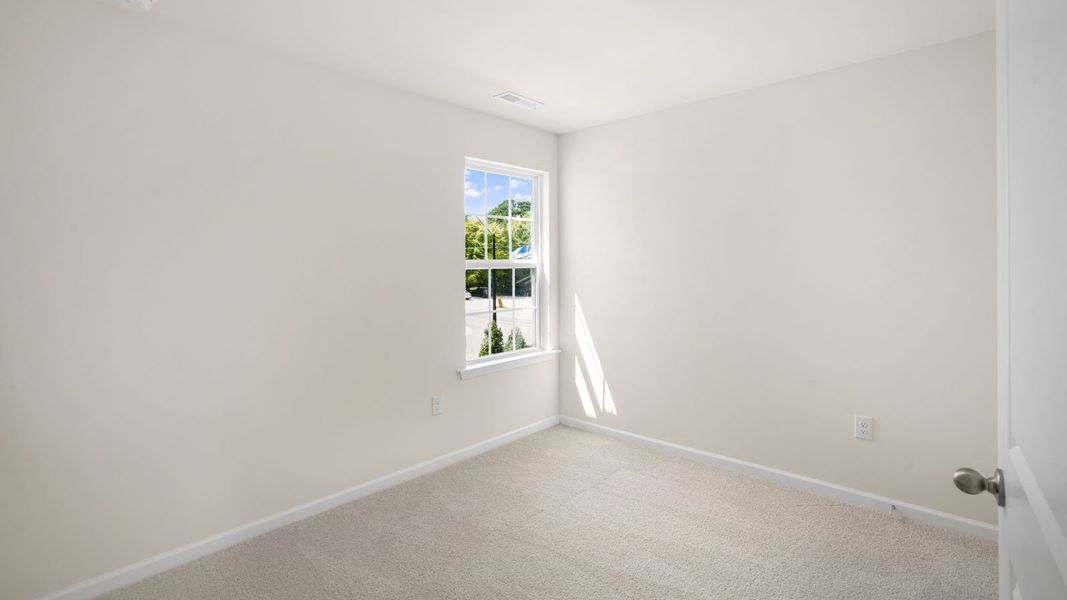 Spacious, unfurnished interior of a new home in Thornton Townes, Raleigh (Image 23).