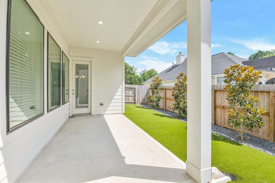 Exterior details and patio area of a home in Summer Place 35', Montgomery (Image 4). Exterior details and patio area of a home in Summer Place 35', Montgomery (Image 4).