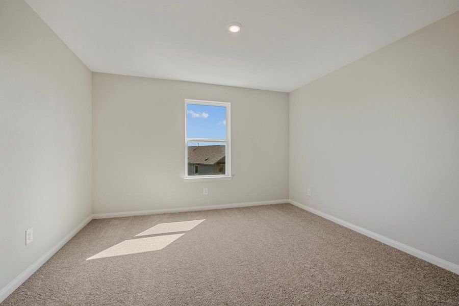 Spacious, unfurnished interior of a new home in Trails at Cochran Ranch, Waller (Image 17).
