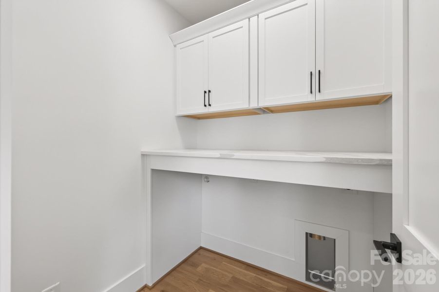 Laundry room with folding counter & shelves